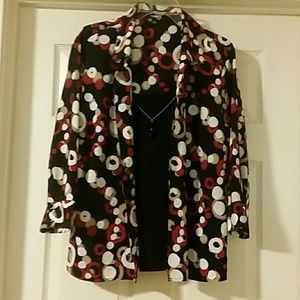 Womans dressy shirt with an attached necklace