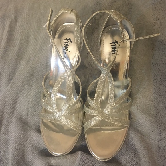 4 1/2 inch Silver Heels Wore Once!!!