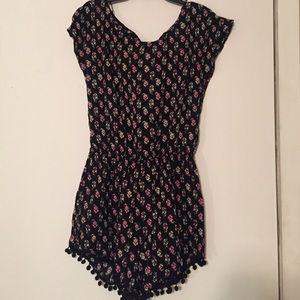 Floral romper (never been worn)