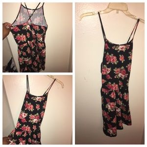 F21 floral  Romper with pockets.