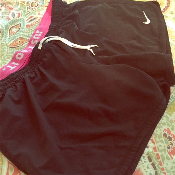 Black Nike Dri-Fit shorts with pink detail - Picture 1 of 3
