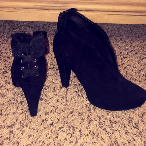 Black booties with bow in back