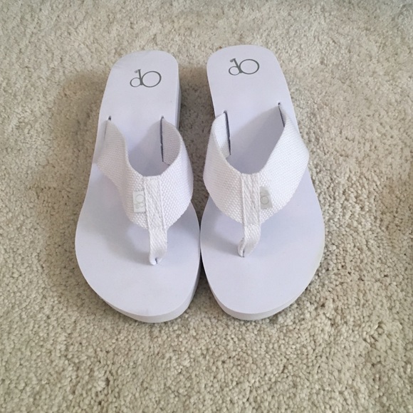 white foam flip flops