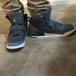 Gray and white Jordan Flights size 6