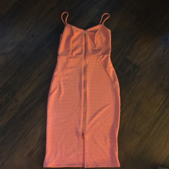 Coral bodycon midi dress.
