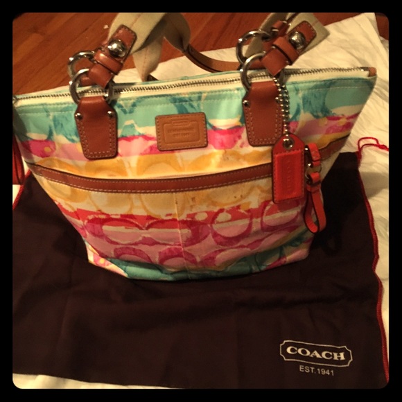 Coach Purse. Tan interior/Orange accents