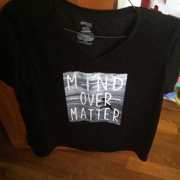 A shirt that says " mind over matter "