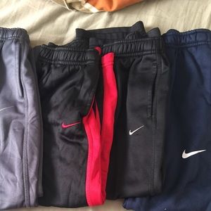 4 pair of boys Nike therma-fit jogging pants