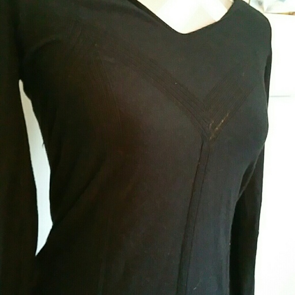 Small black sweater, beautiful front details!