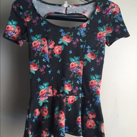 Floral peplum top with back cut-out!