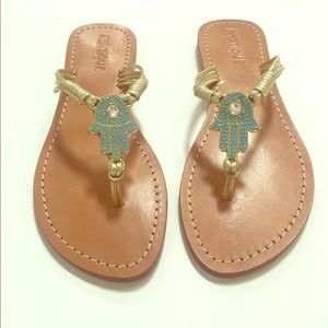 Gold strap embellished thong sandals with hamsa
