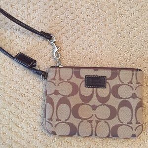 Tiny coach wristlet