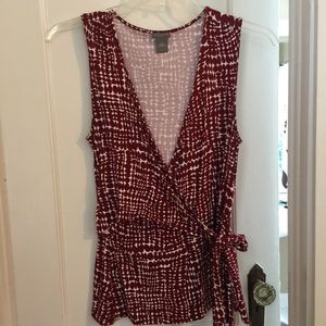 Garnet and white sleeveless wrap blouse