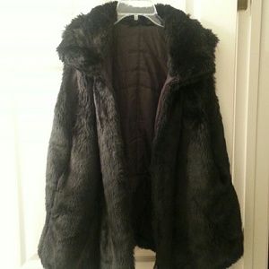 Reversible black faux fur vest