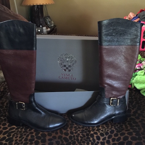 Black and brown riding boots