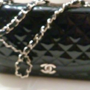 Black leather handbag with gold hardware