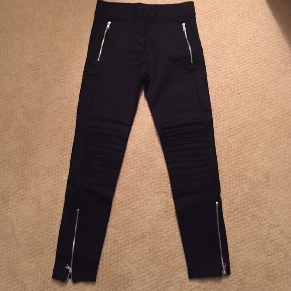 Black cigarette pants with ribbing and zippers