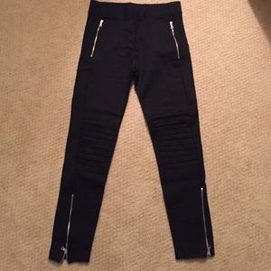 Black cigarette pants with ribbing and zippers