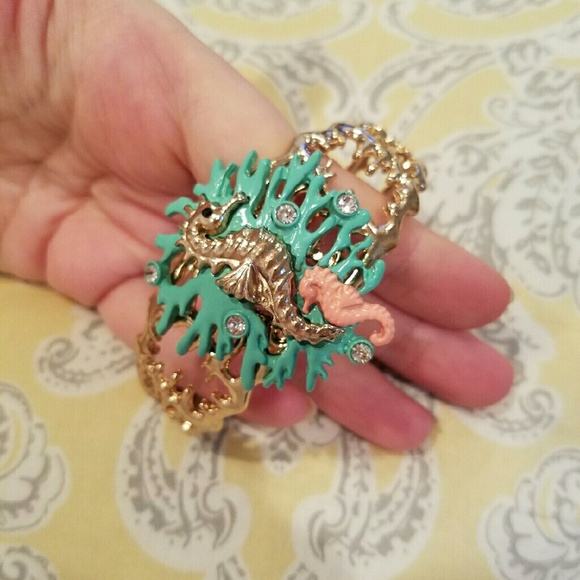 Seahorse on coral gold bracelet with rhinestones