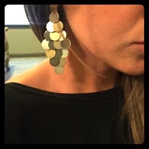Gold, silver, and black Express earrings