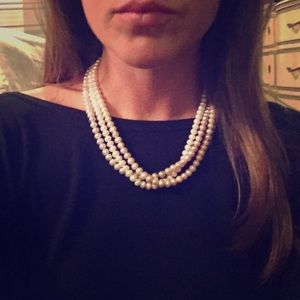 Three strand faux pearl necklace