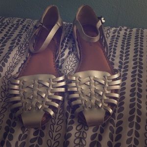 Gold American Eagle flats