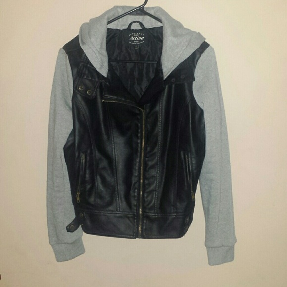 Jacket pleather with grey sleeves.
