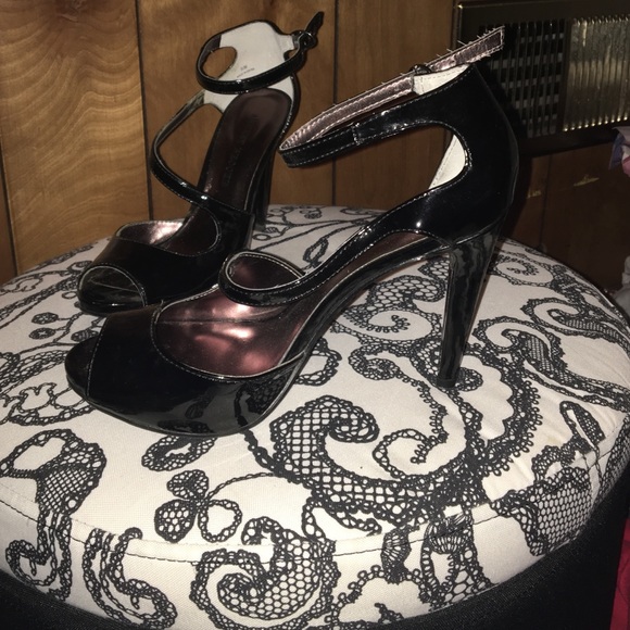 Audrey Brooke black peep toe heels.