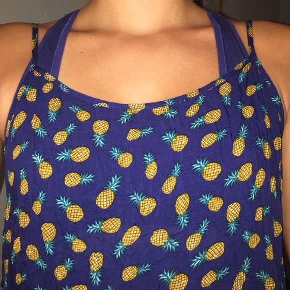 Sure cute Hawaiian/pineapple shirt.