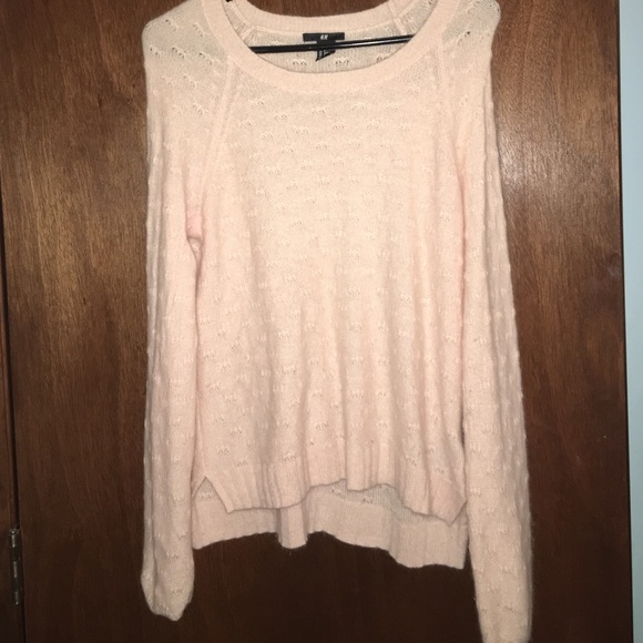 Light pink sweater.