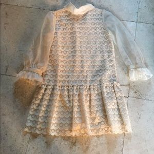 Lace mini dress with peplum and sheer sleeves