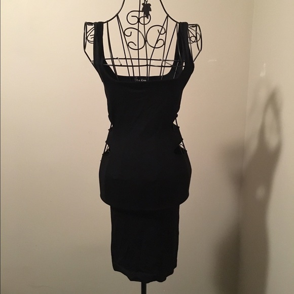 bebe Dresses & Skirts - Bebe cut out mini dress