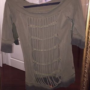 Green off the shoulders shirt, with open back