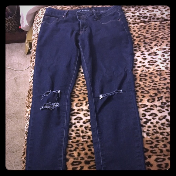 Distressed jeans.