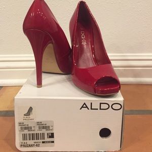Red peep toe pumps