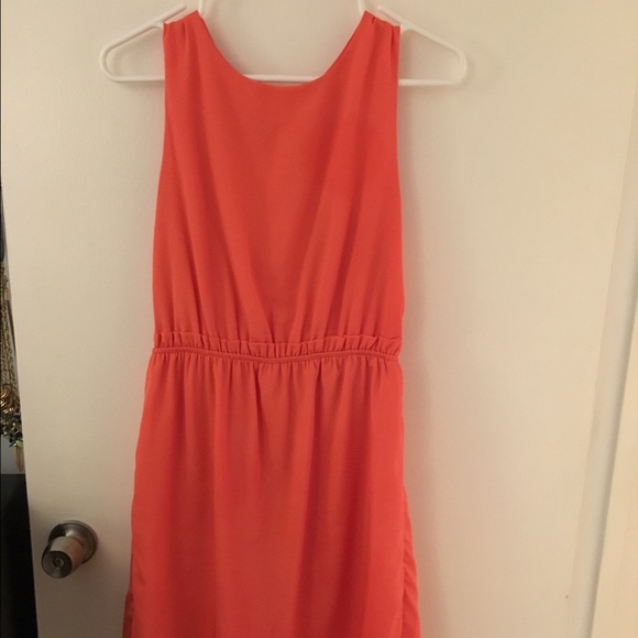 Beautiful open back coral dress.