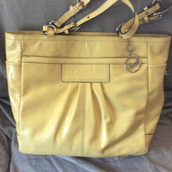 Coach hand bag with matching wallet .