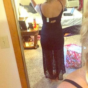 Sexy lacy black dress with short underskirt.