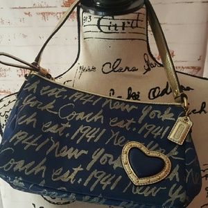 Coach large size clutch