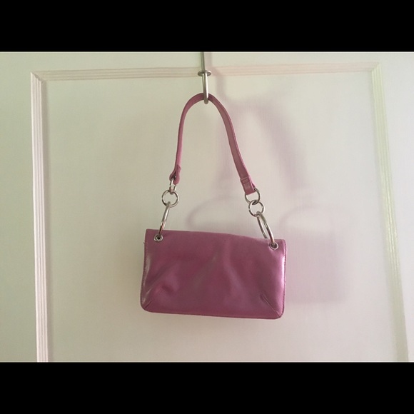 Pink leather clutch