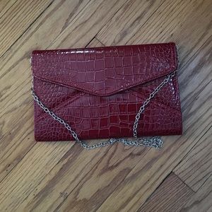 New Aldo burgundy clutch