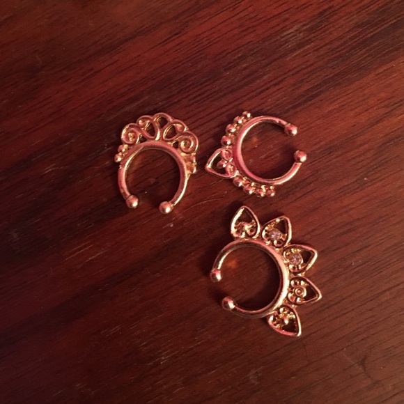 Brand new never used faux gold septum rings