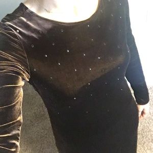 Long sleeved dress. Rhine stone detail. Open back