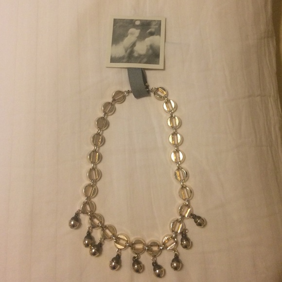 Silver necklace with green beeds