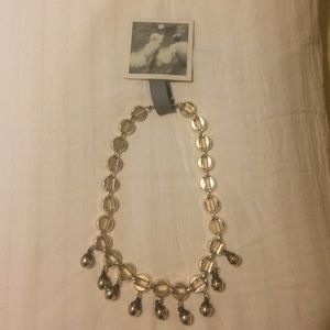 Silver necklace with green beeds