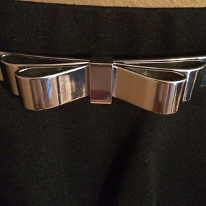 BCBG MaxAzria metal bow belt with leather waist