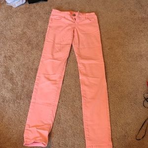 American Eagle pink skinny jeans