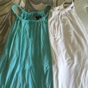 Two high neck tunic tanks
