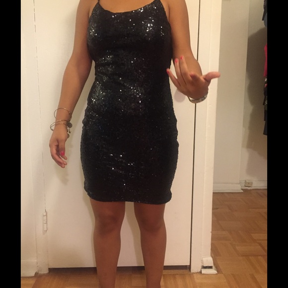 Glitter backless mini dress.