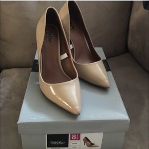 Pointy nude heels